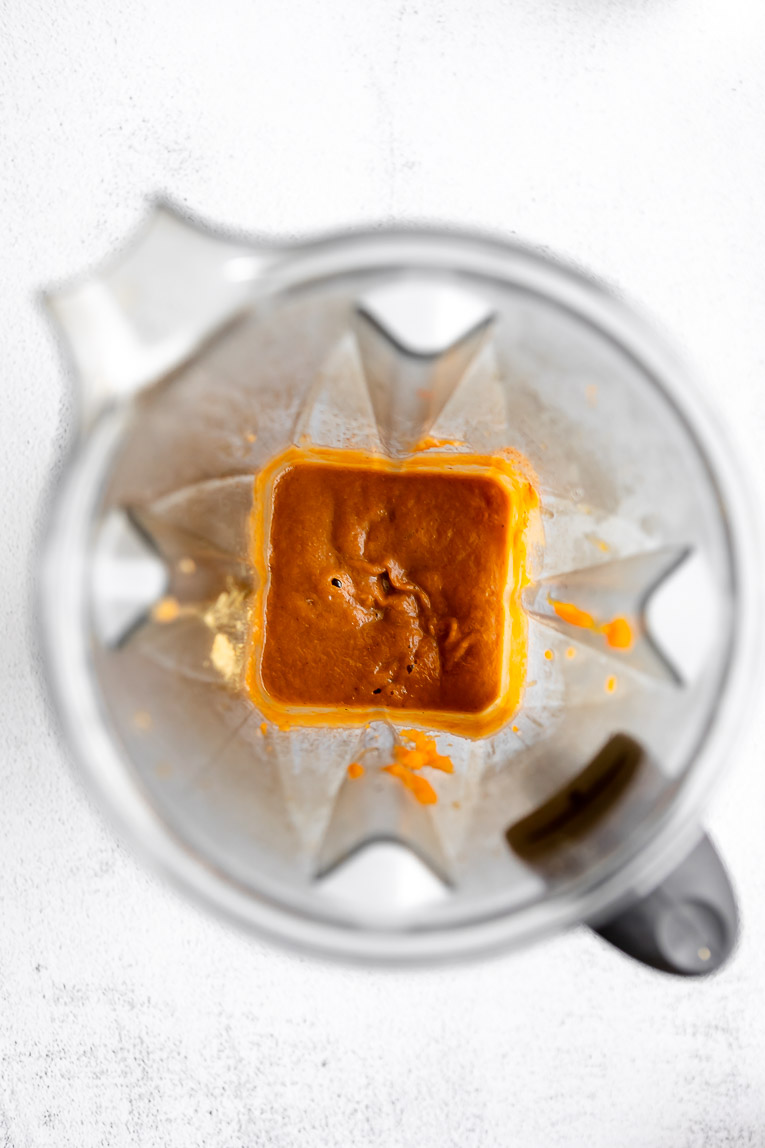 Pumpkin pie filling in a blender.