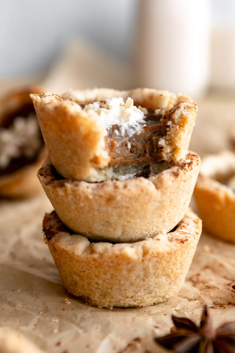 Stack of healthy mini pumpkin pies.