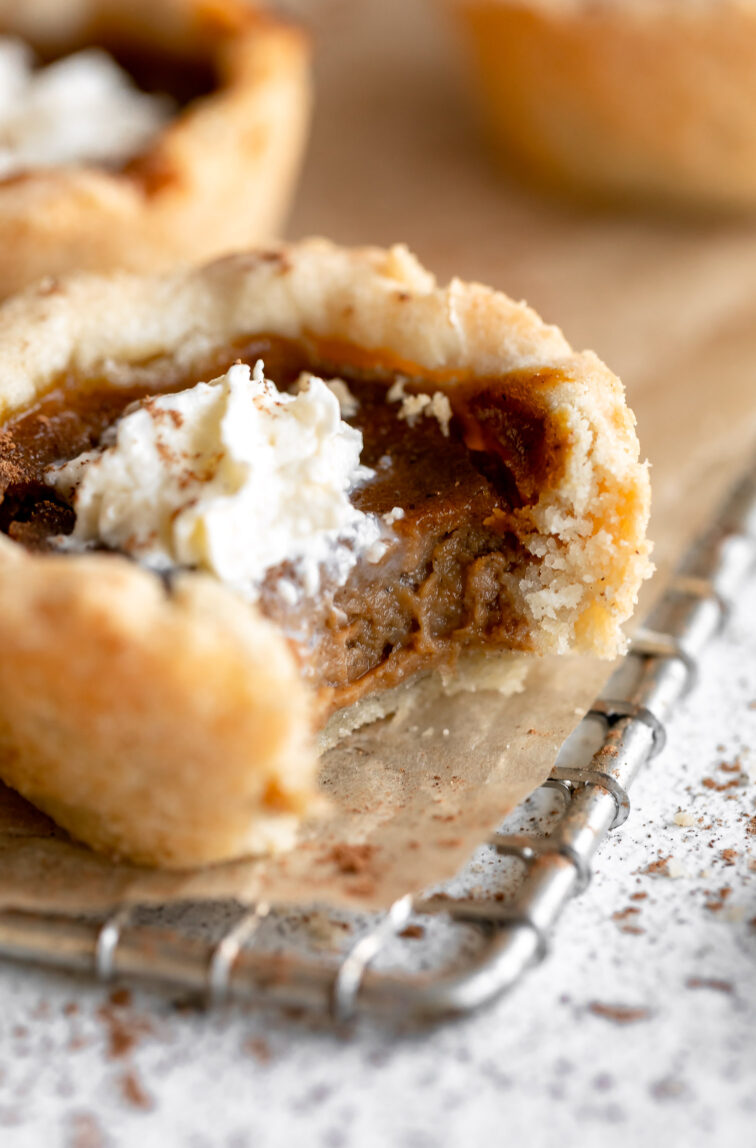 Close up photo of mini pumpkin pie bite.