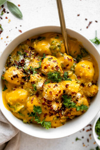 Creamy butternut squash gnocchi recipe in a bowl.