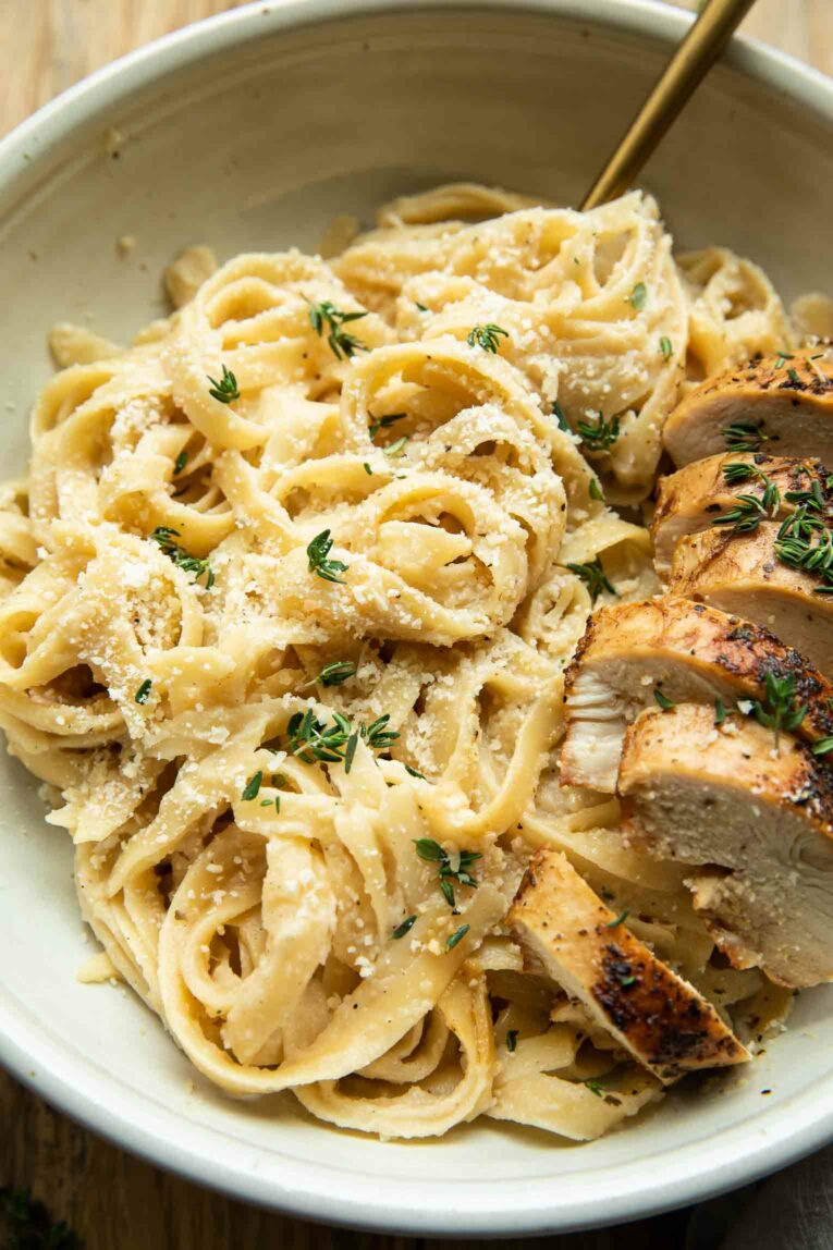 Angled photo of Healthy Chicken Alfredo with Cauliflower Sauce.