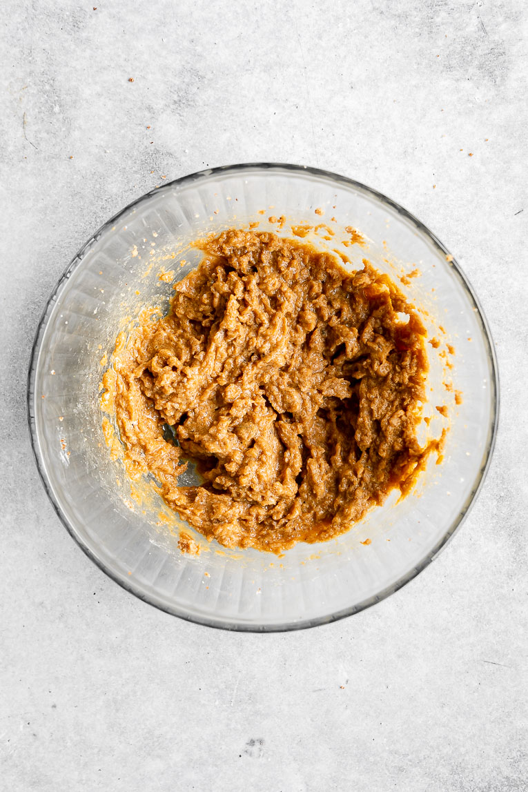 Oat flour cookie dough in a mixing bowl.