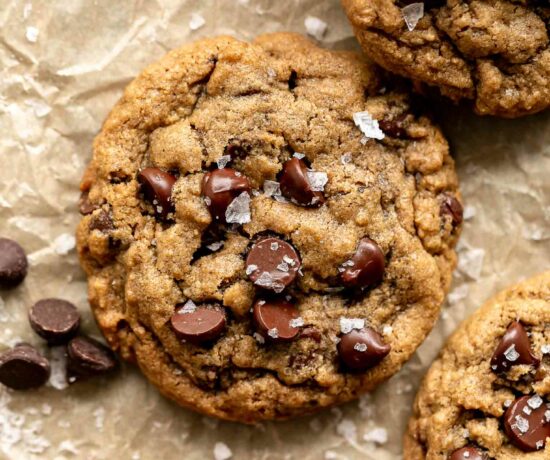 Oat Flour Chocolate Chip Cookies recipe on parchment paper.