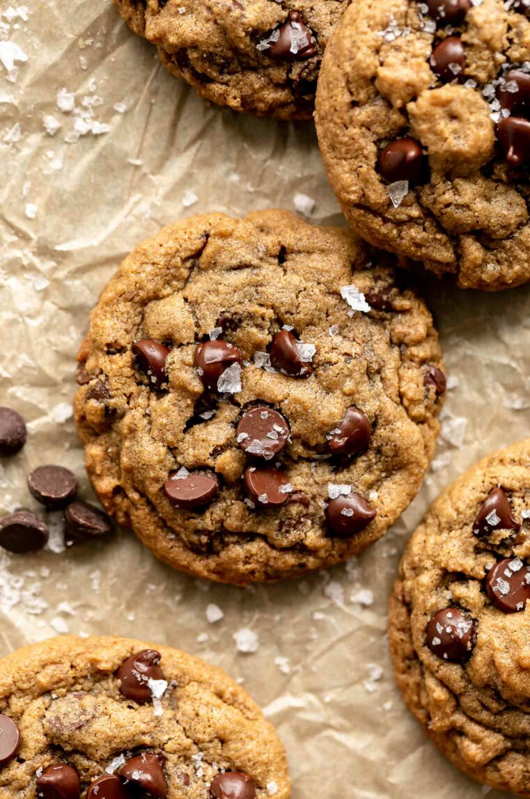Oat Flour Chocolate Chip Cookies recipe on parchment paper.