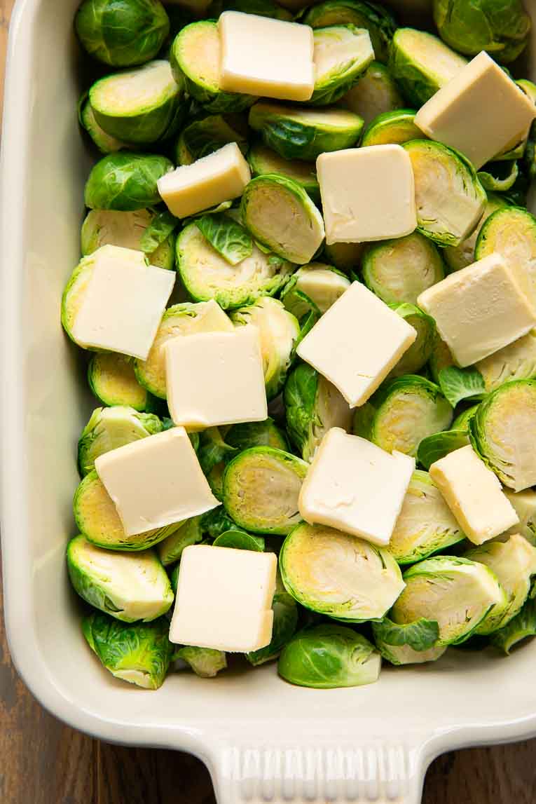 Fresh brussels sprouts with butter on top.