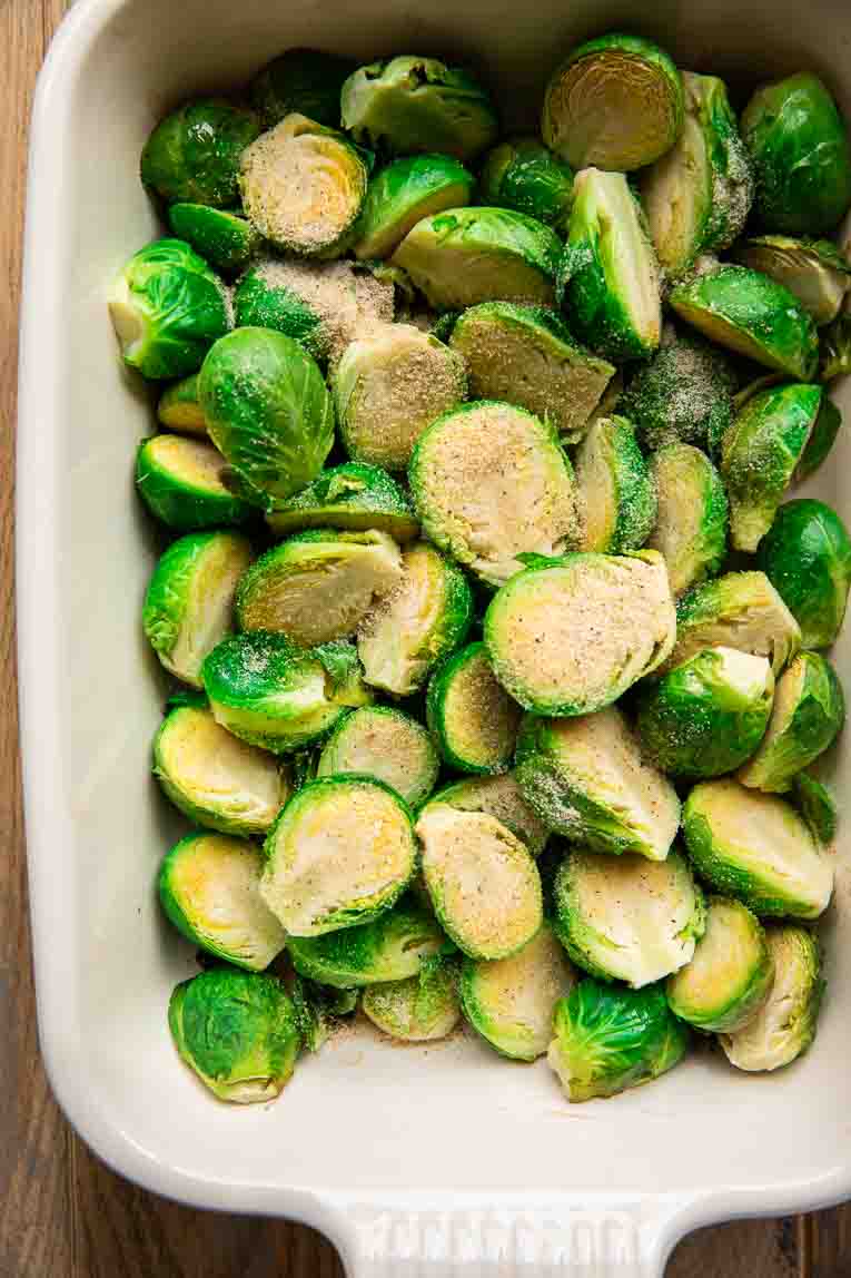Brussels sprouts with butter and garlic being roasted.