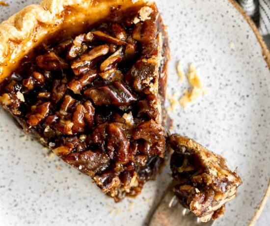 Top photo of vegan pecan pie slice on a plate.
