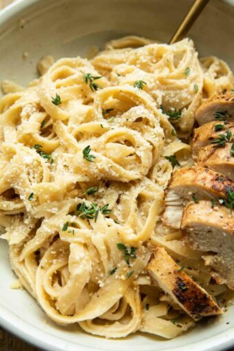 Angled photo of Healthy Chicken Alfredo with Cauliflower Sauce.