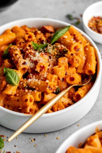 Angled photo of Spicy Vodka Pasta in a bowl.