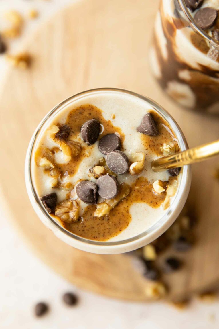 Top shot photo of banana chocolate almond butter smoothie.