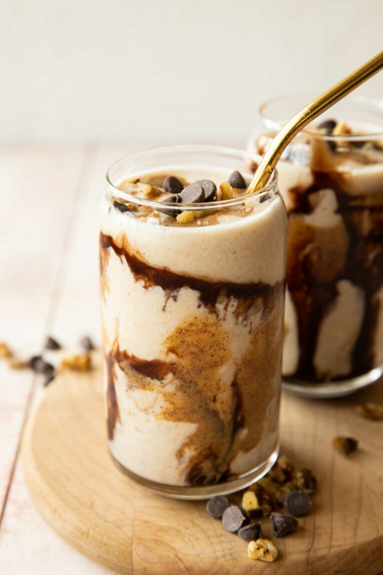 Angled photo of Chunky monkey smoothie on a cutting board.