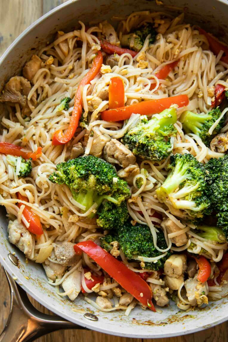 Healthy chicken pad Thai in a skillet.