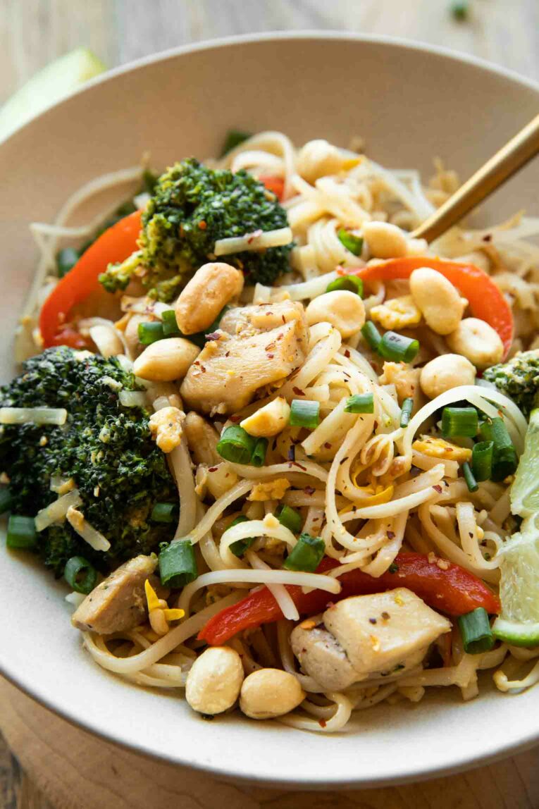 Angled for of easy, Healthy Chicken Pad Thai for weeknight dinners.