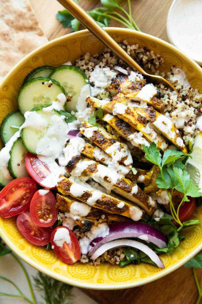 Chicken Shawarma Grain Bowls with yogurt sauce.