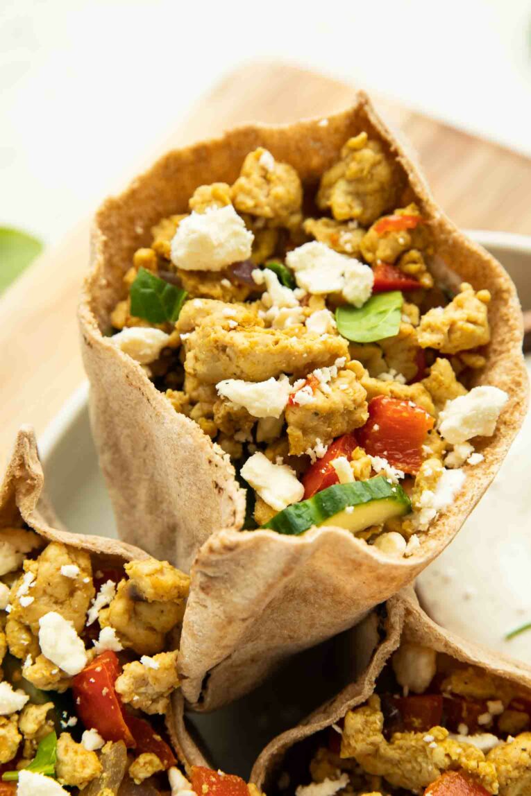 Angled close up of Greek-Inspired Turkey Pita Sandwich.