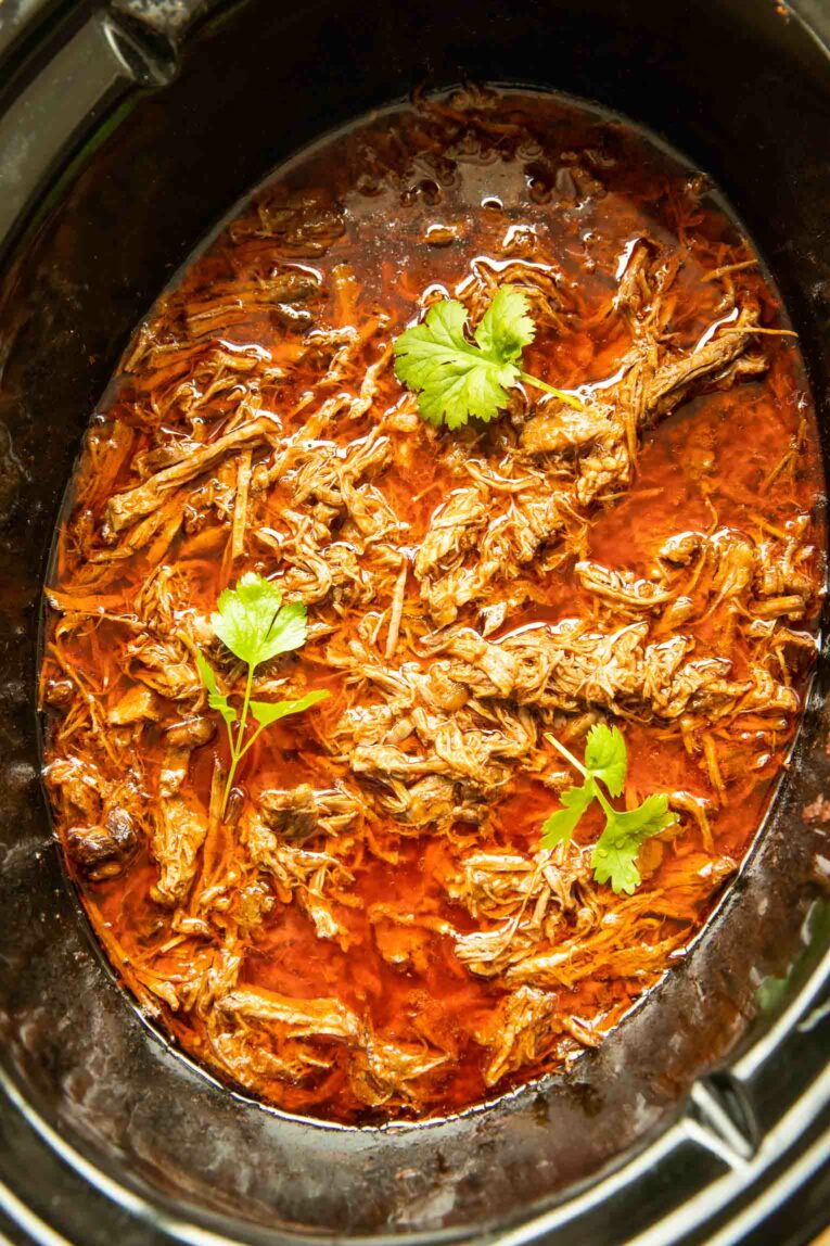 Slow Cooker Birria recipe with cilantro.