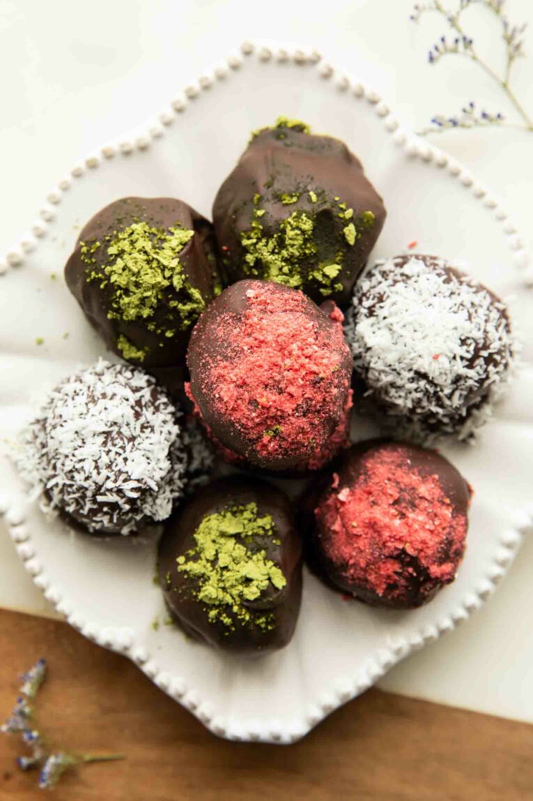 Superfood Chocolate Bites stacked on a plate.
