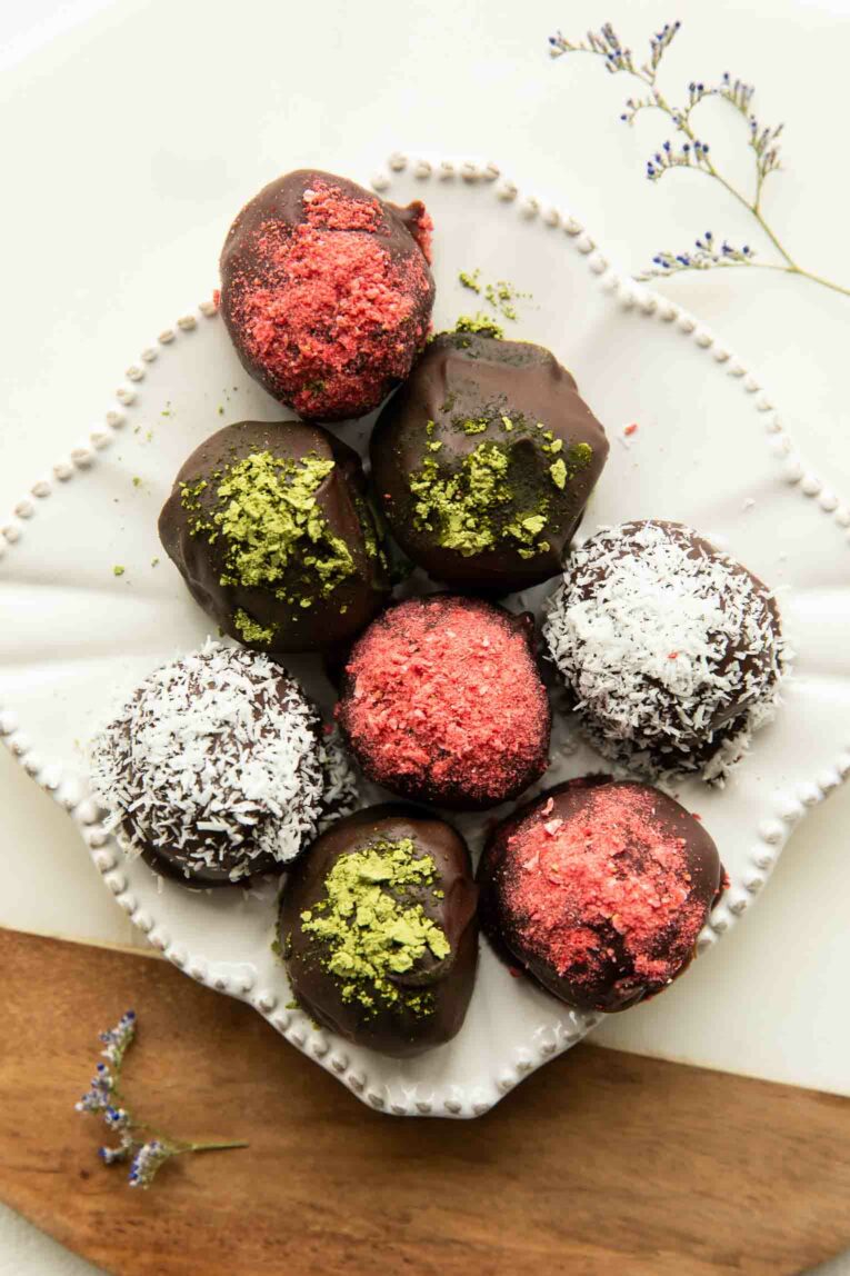 Superfood Chocolate Bites with multiple colored toppings.