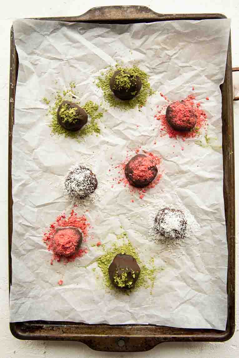 Chocolate bites with superfood powder toppings.
