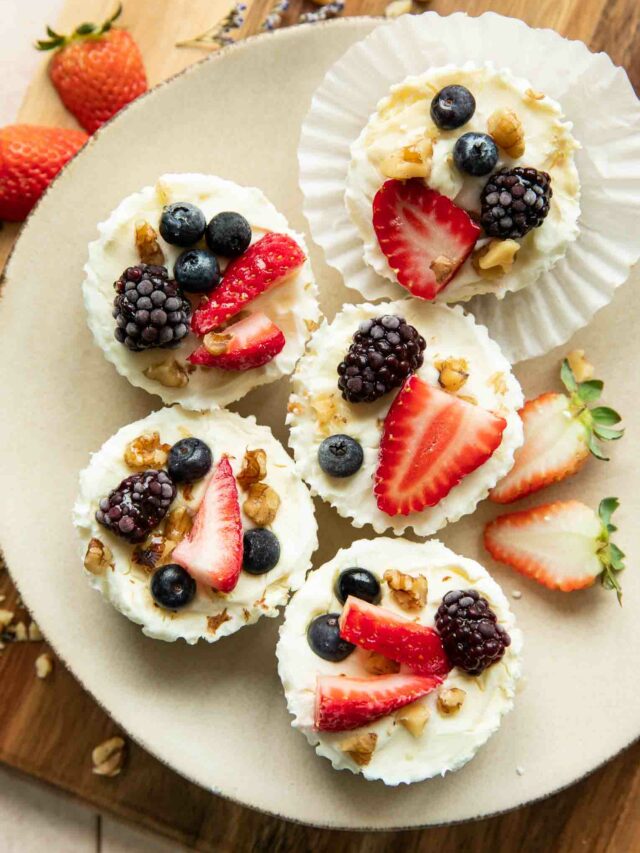 Frozen Yogurt Granola Cups on a plate with fruit.