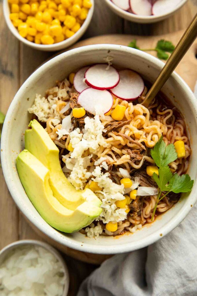Birria ramen bowls recipe with toppings.