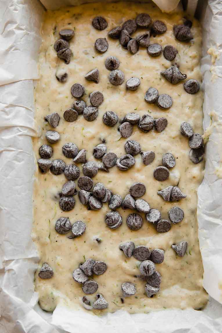 Chocolate Chip Zucchini Bread batter poured into a loaf pan.