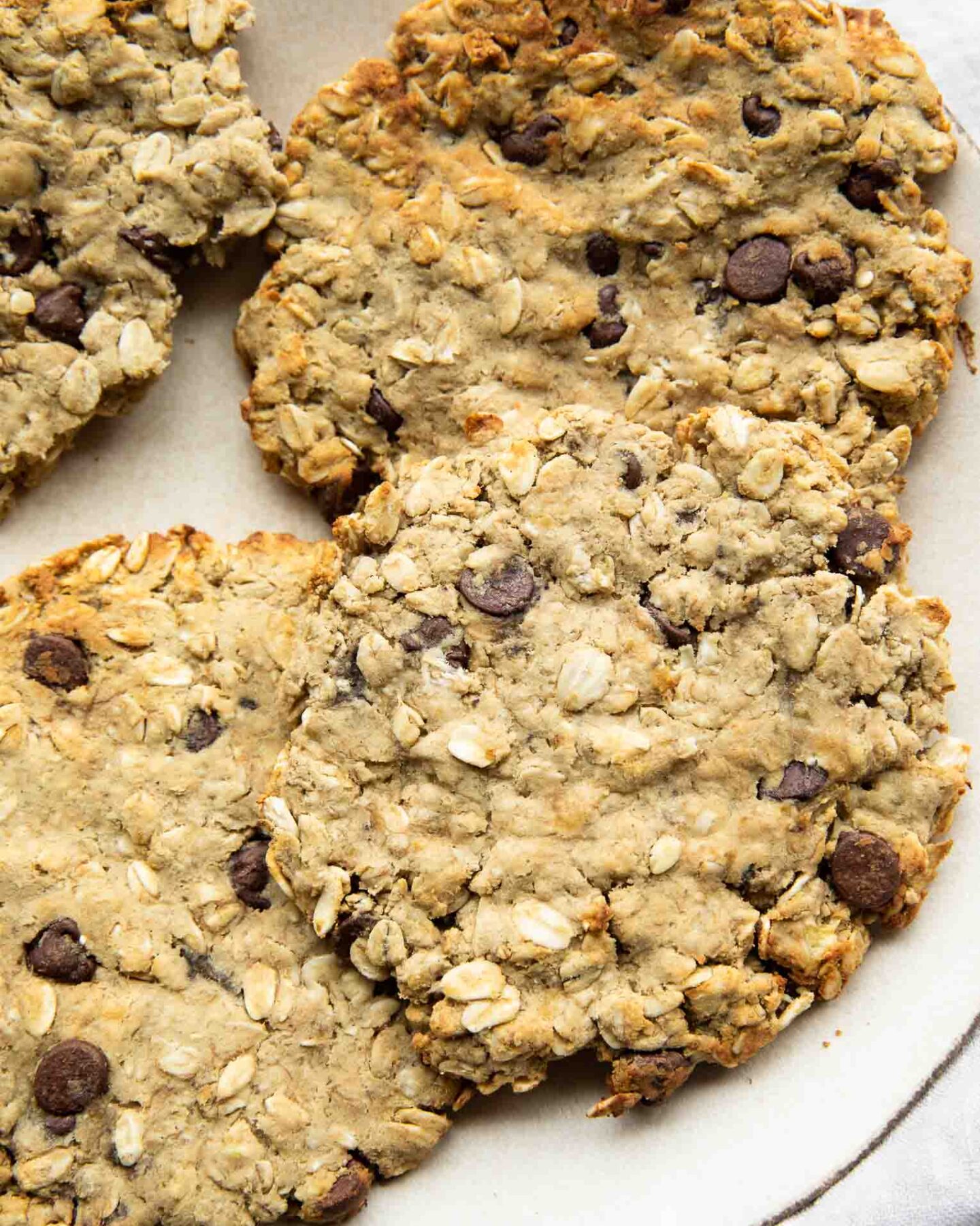 Giant air fryer cookies with protein on a plate.