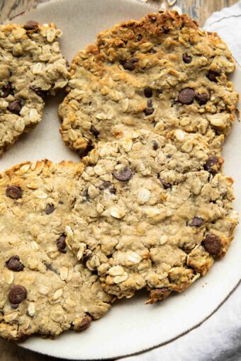 Giant air fryer cookies with protein on a plate.
