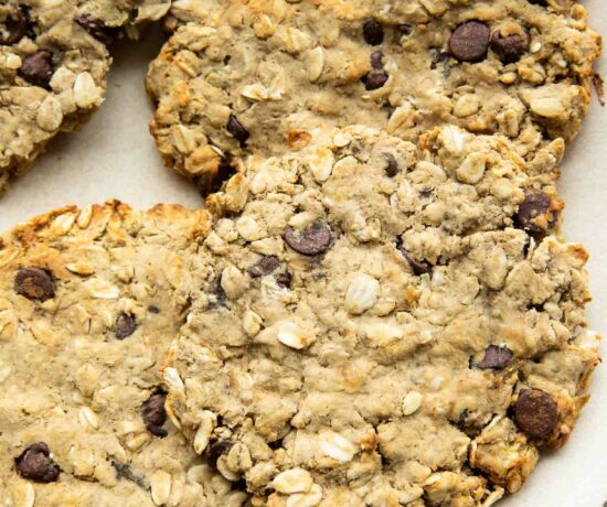Giant air fryer cookies with protein on a plate.