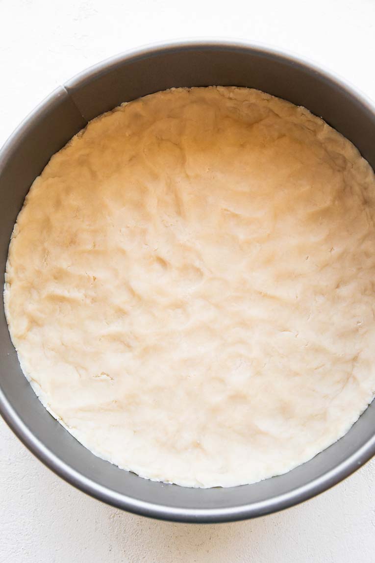Vegan pie crust in a springform pan.