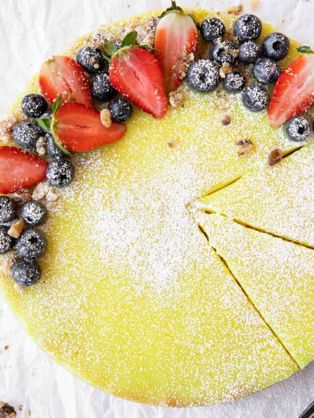 Vegan Berry Lemon Curd Tart recipe on parchment paper.