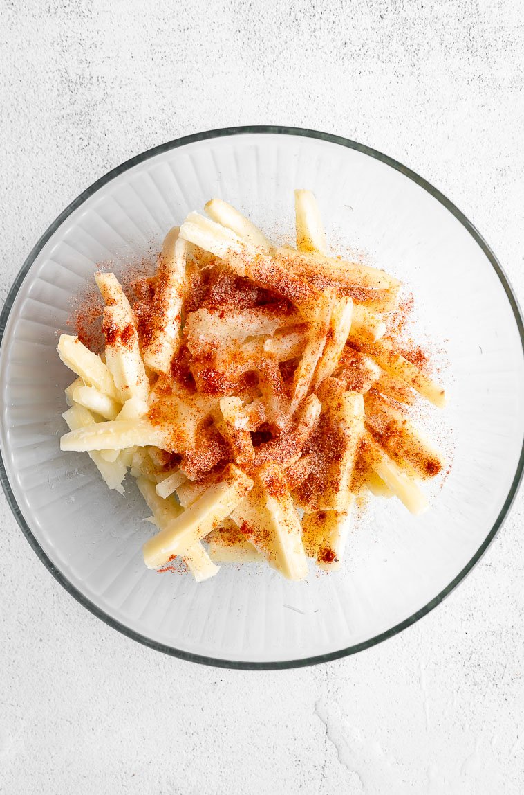 Boiled yuca tossed with oil and spices.