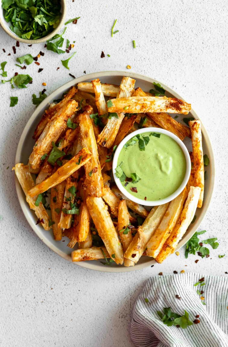 Crispy Yuca Fries Recipe with cilantro sauce.