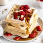 Gluten-Free Waffles Recipe stacked on a plate.