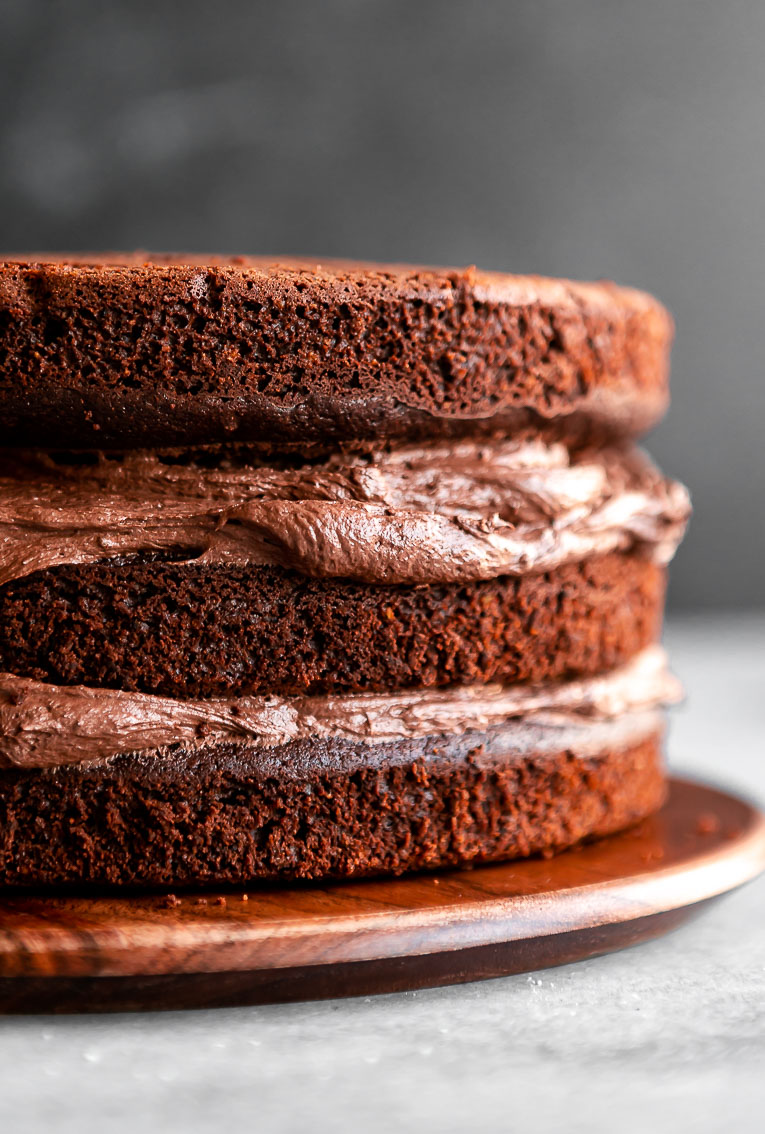 3 layers of gluten-free chocolate cake with tahini icing.