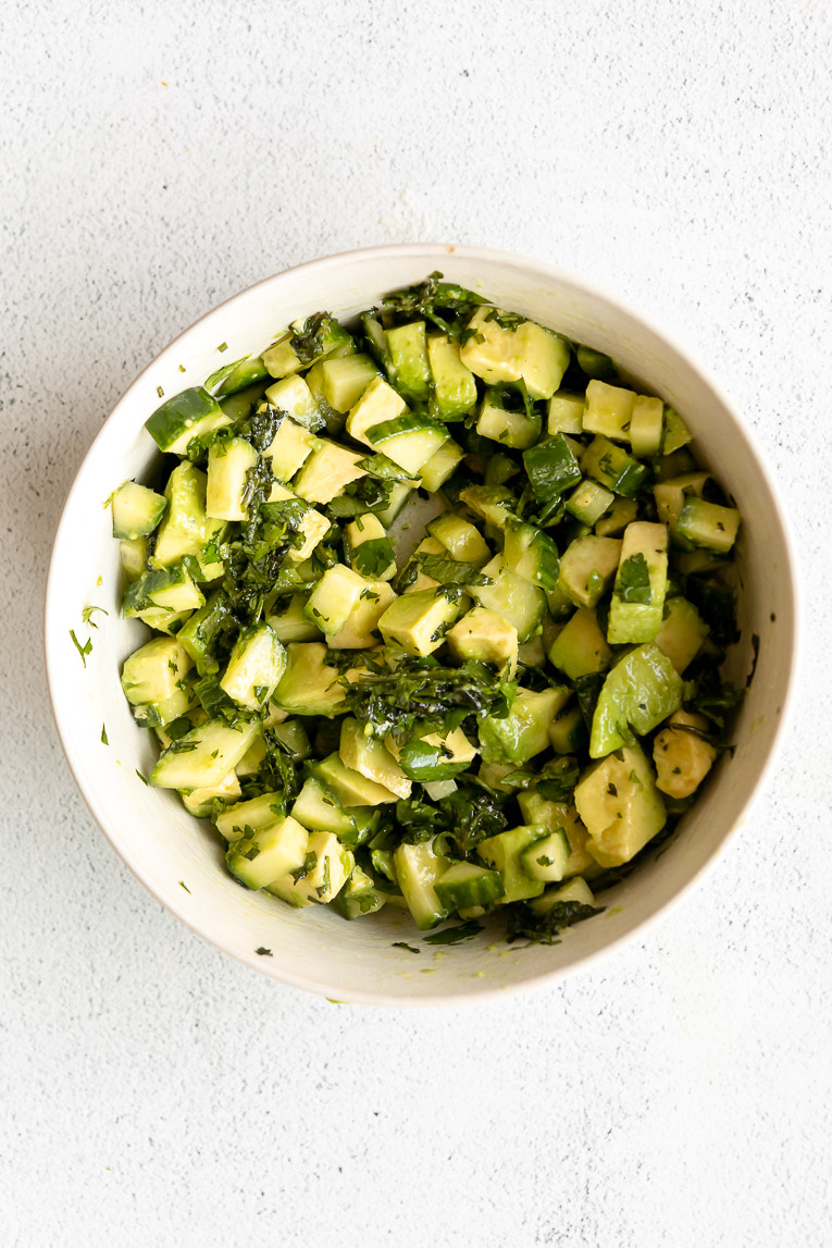 Avocado and cucumber tossed with cilantro, lime, and olive oil.