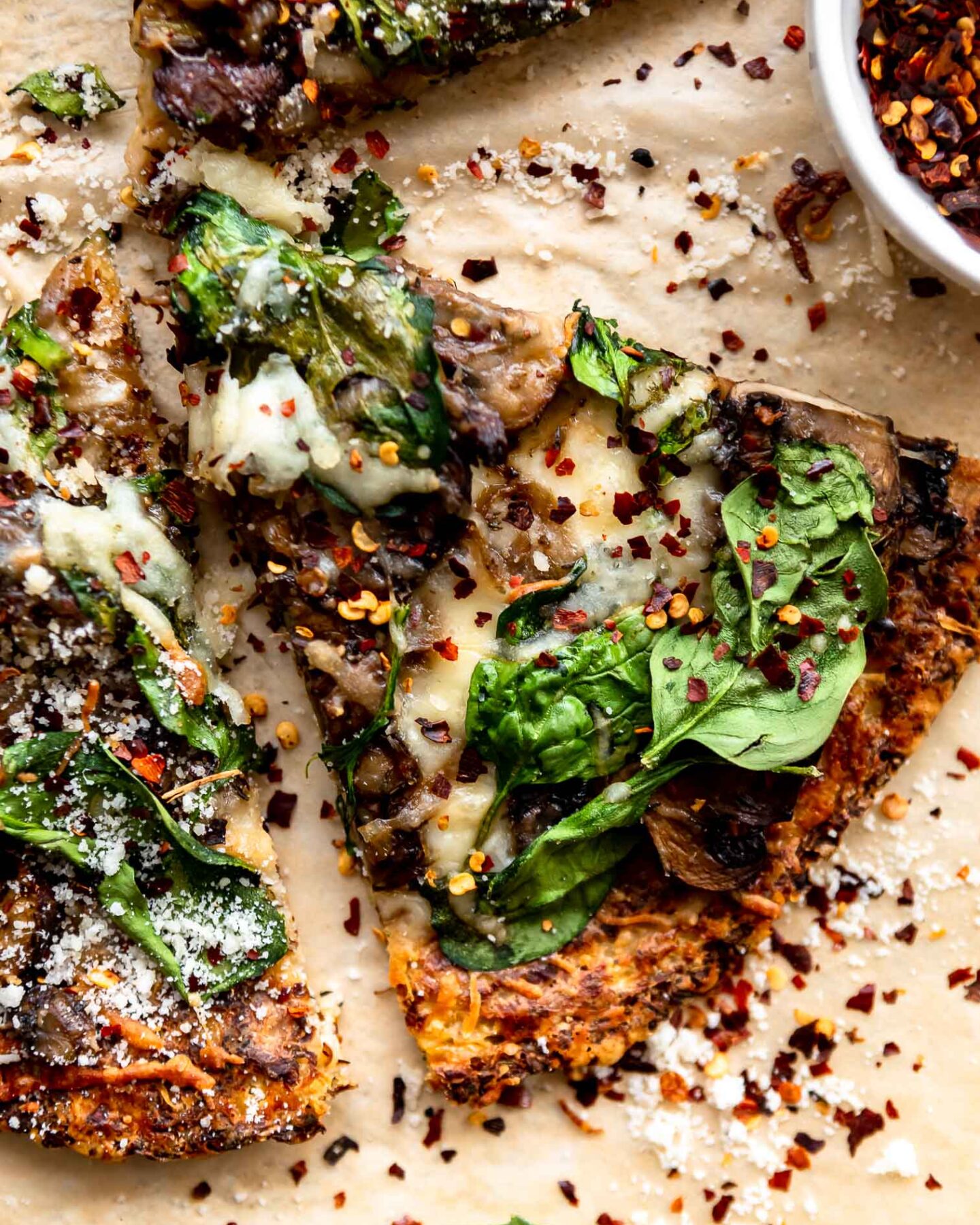 Slice of mushroom cauliflower crust pizza recipe.