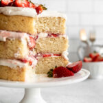 3-layer Vegan Strawberry Shortcake recipe on a cake stand.