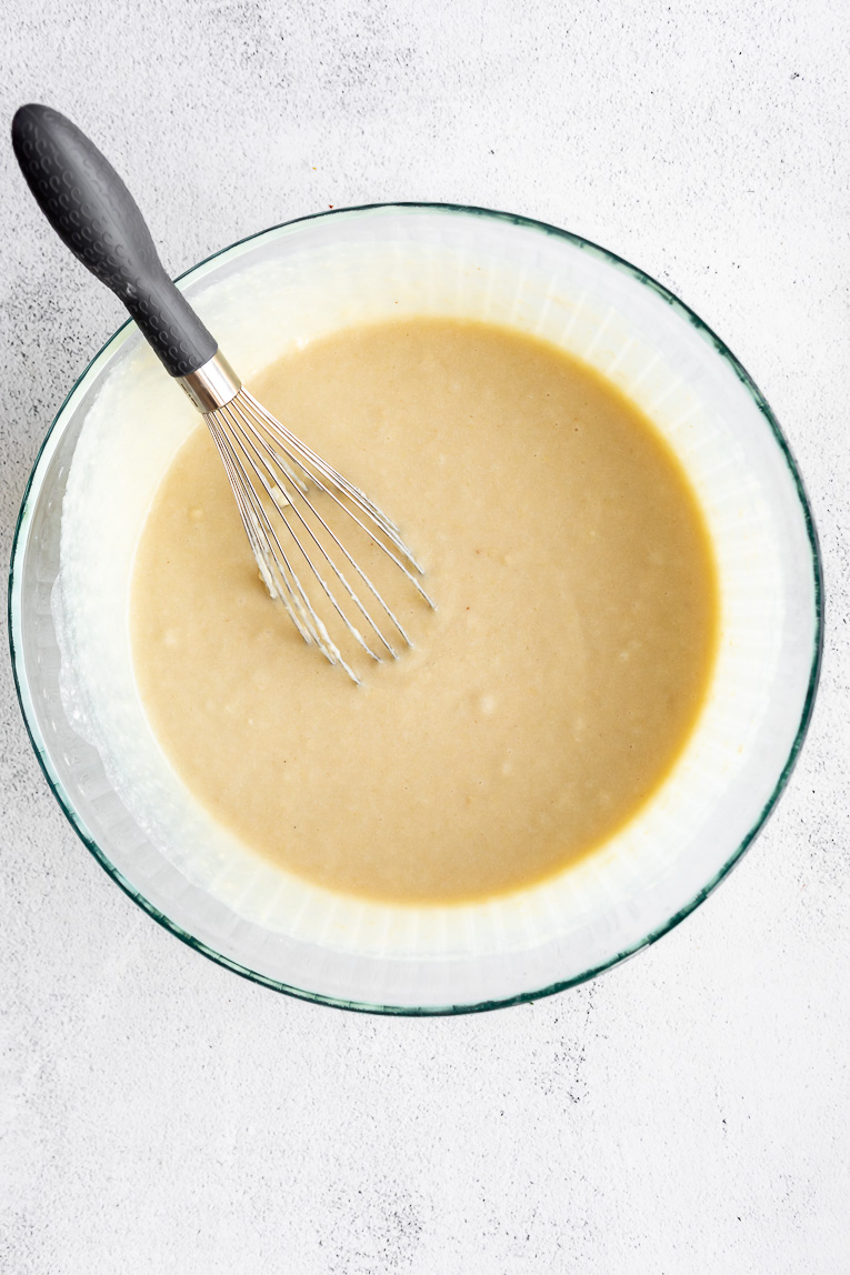 Vegan cake batter in a mixing bowl.