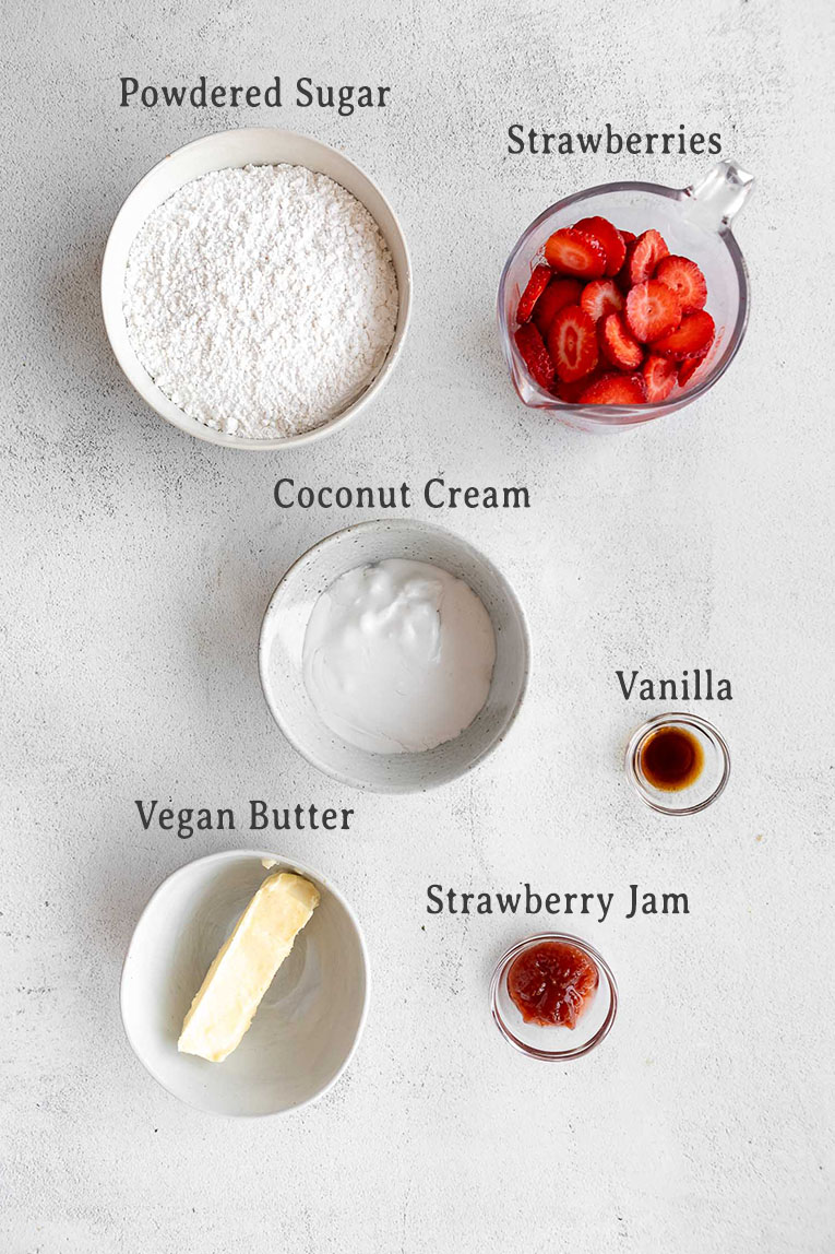 Ingredients for vegan frosting and strawberry toppings for shortcake recipe.