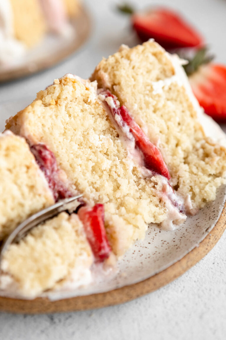 Slice of Vegan Strawberry Shortcake with a fork.