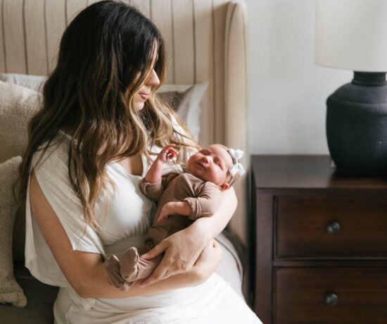 Newborn baby with mom.