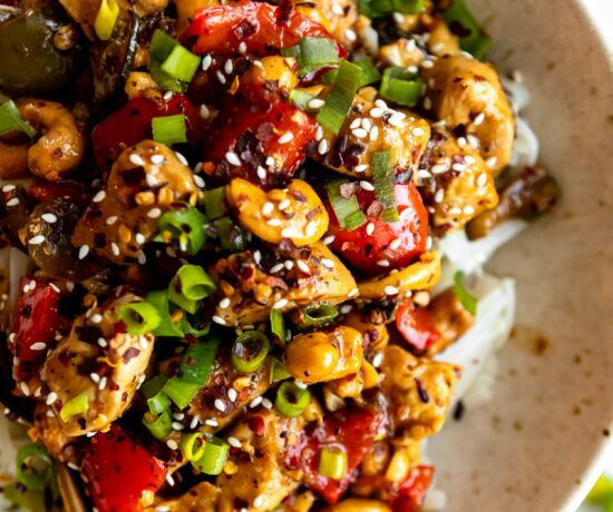 Spicy Cashew Chicken Noodle Bowl with fork.
