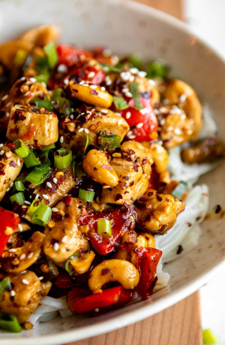 Close up of cashew chicken recipe with noodles and vegetables.