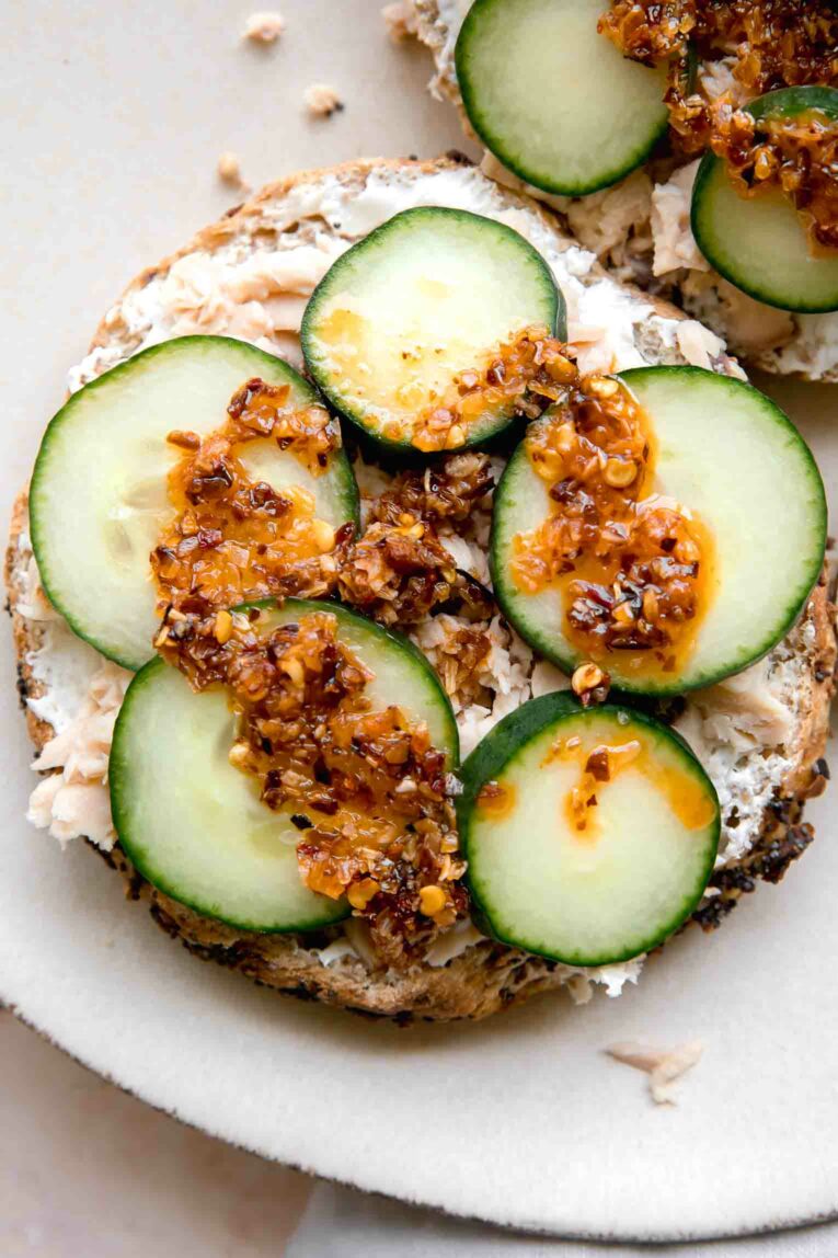 Close up of Chili Crunch Salmon Cream Cheese Bagel.
