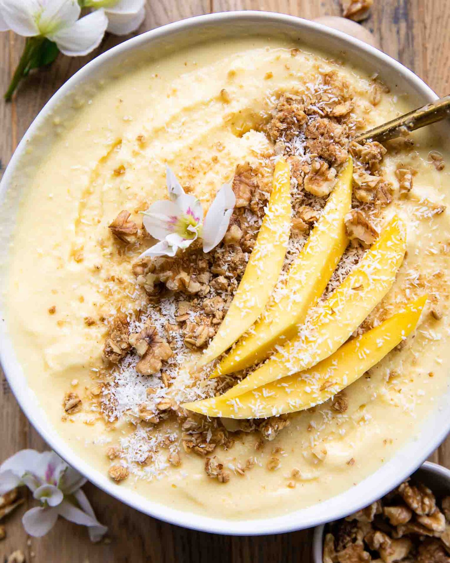 Mango Pineapple Smoothie bowl with coconut
