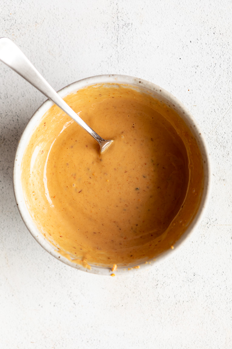 Peanut sauce for Thai tacos in a bowl.