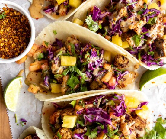 Vegan Spicy Thai Tofu Tacos on a wood table.