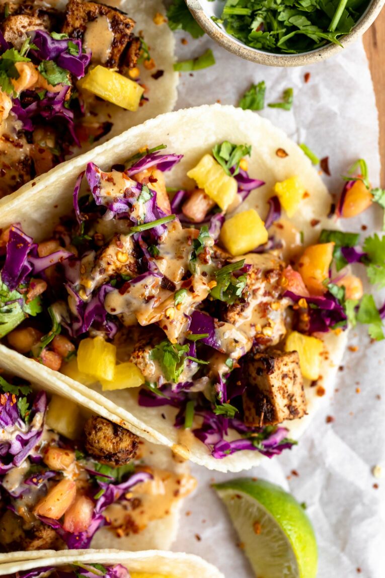 Close up of tofu taco with thai flavors.