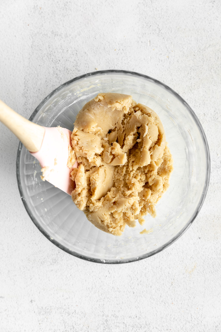 Healthy cheesecake crust being mixed together.